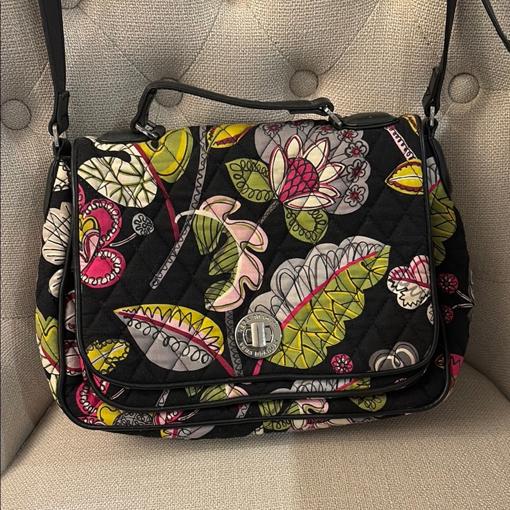Vera Bradley Black Quilted Crossbody Bag with Artistic Floral Design.